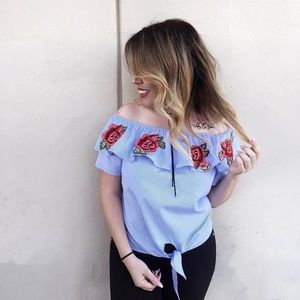 Blue shirt with roses